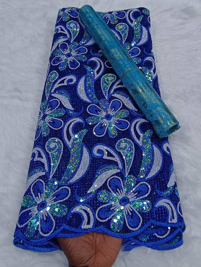 Royal blue English lace with a vibrant blue and silver brocade